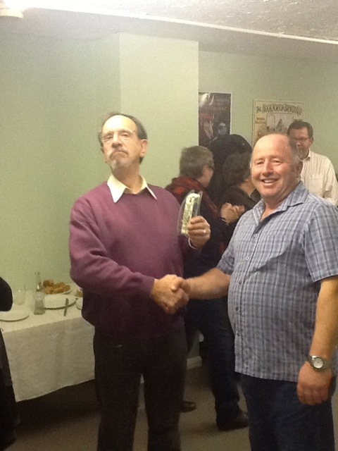 Paul receives the Ale'd and Aimless trophy from organiser Michael Trolove