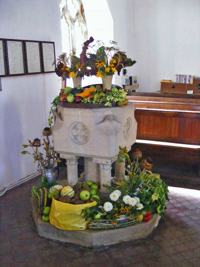 Harvest festival decorations and font, St Michael's Church, Great Gidding 2009