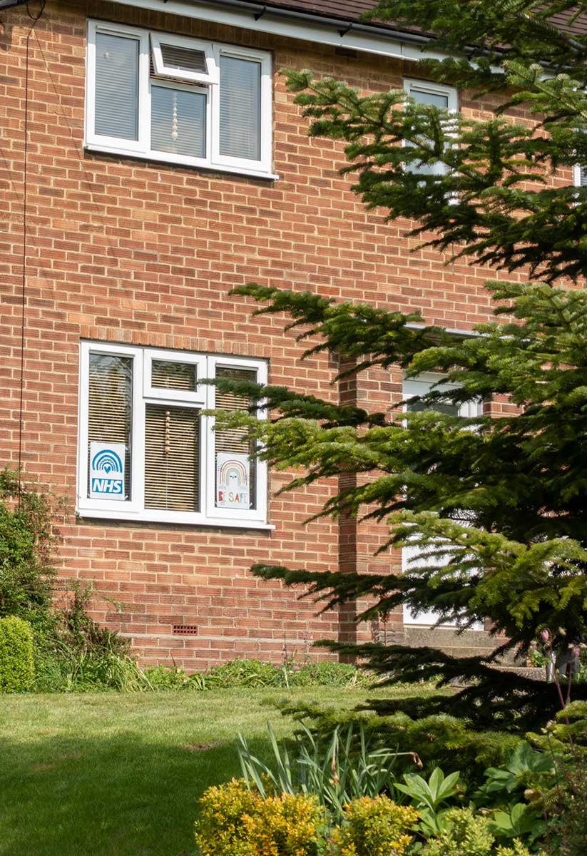 NHS signs in window on Chapel End