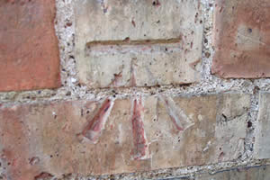 Benchmark on a house in Great Gidding