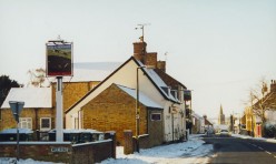 The Fox and Hounds in the snow