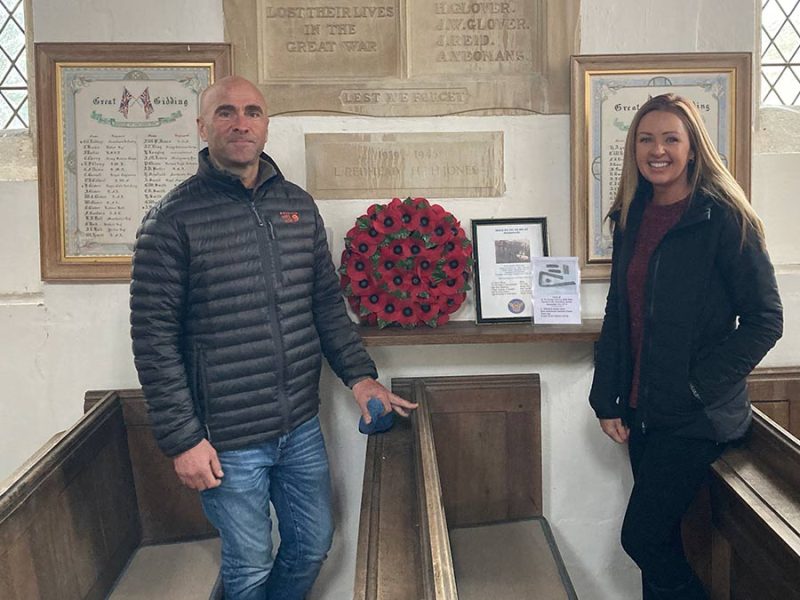 Heather and Federico infant of the Memorial to the pilots of the B17 Bam Bam